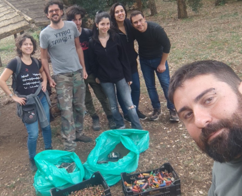 Gabriele Primavera and his squad in Parco della Sughereta, collecting cork oak acorns, rifle casing and garbage